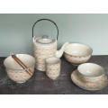 Porcelain dinnerware set with teapot